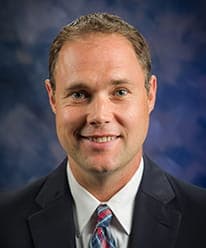 Headshot of John Brand, Bitcoin-aware financial advisor in Elmira, NY